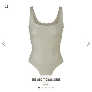 New w/ tags. SKIMS Faux Leather Scoop Bodysuit Size:3X Color: Shell